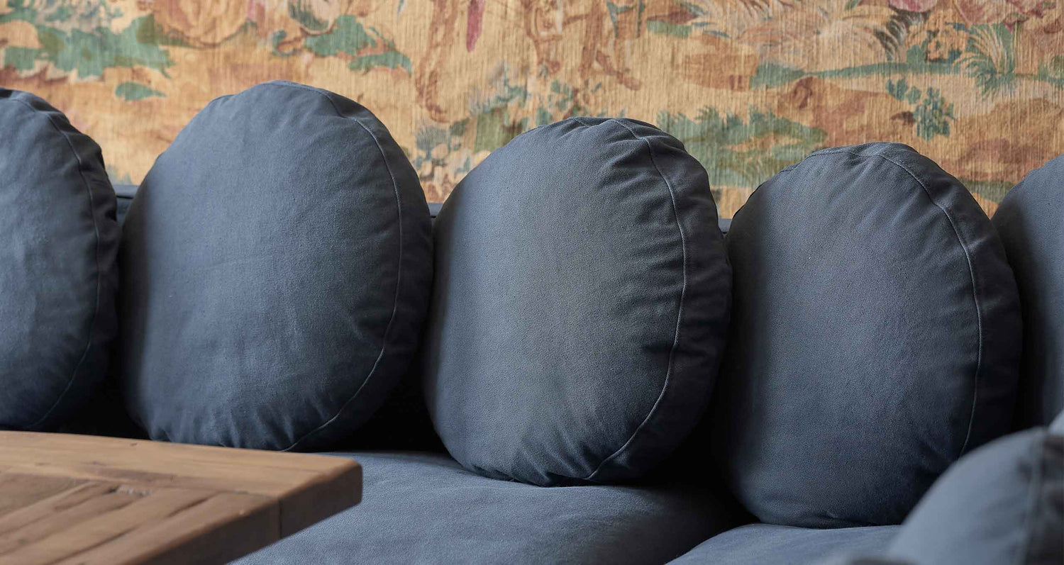 Close up of the Olea Banquette cushions in Cotton Canvas Ancient Indigo