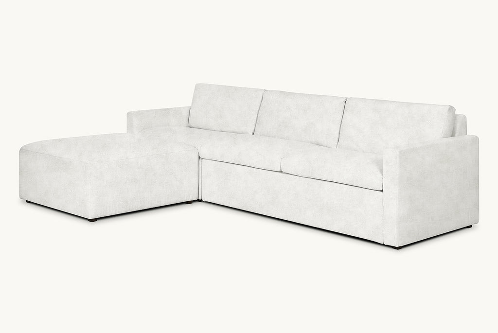 Devyn Sleeper Chaise Sectional in Dandelion Poof, a creamy off-white Recycled Faux Fur