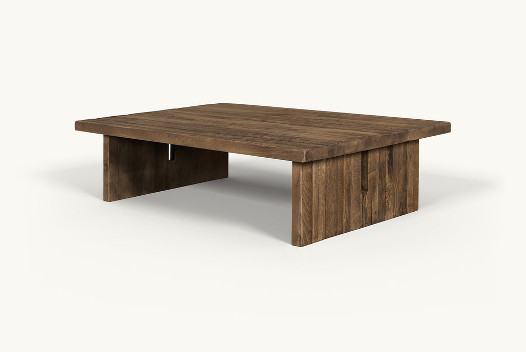 Angled view of Kai Coffee Table in 100% Reclaimed Austrian Heritage Oak, a medium bosc pear shade with earthy undertones.
