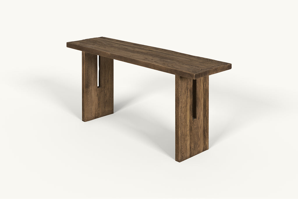 Angled view of Kai Console Table in 100% Reclaimed Austrian Heritage Oak, a medium, bosc pear shade with earthy undertones