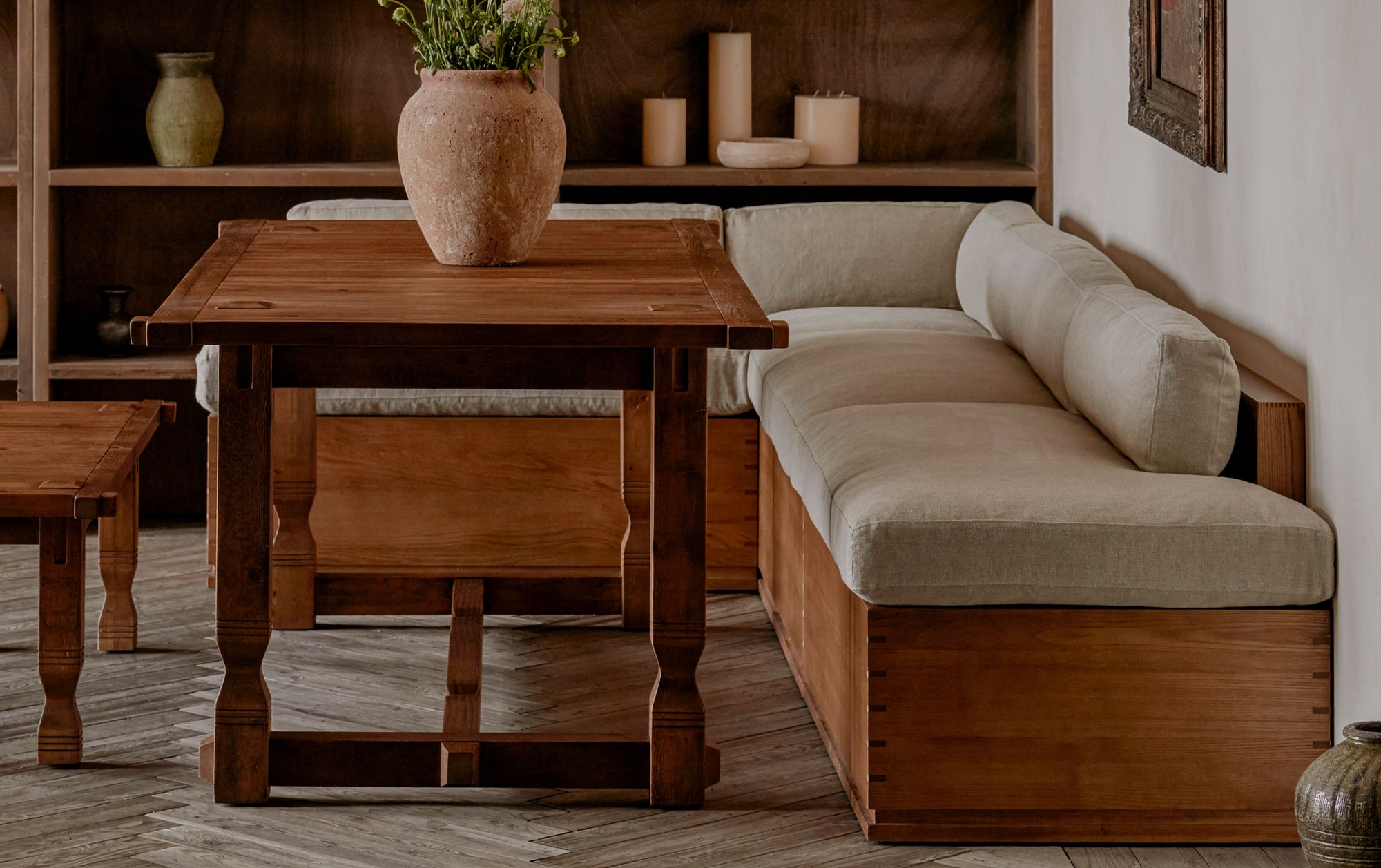 Monti Storage Banquette in Oat Flour, a medium taupe Light Weight Linen placed with the Ora Dining Table