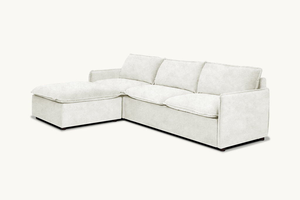 Neva Sleeper Chaise Sectional in Dandelion Poof, a creamy off-white Recycled Faux Fur
