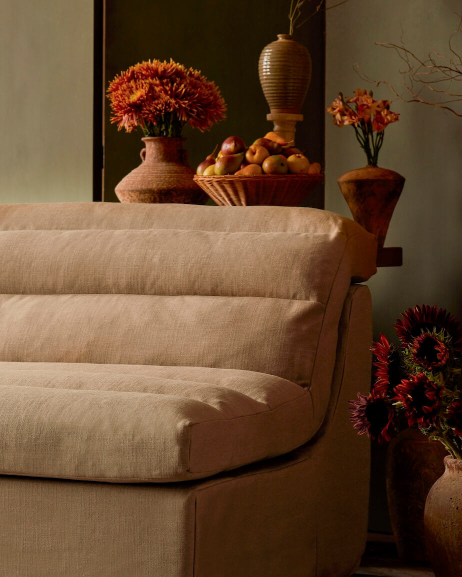 Juno Sofa in Branch Out, a golden brown linen-like recycled polyester.