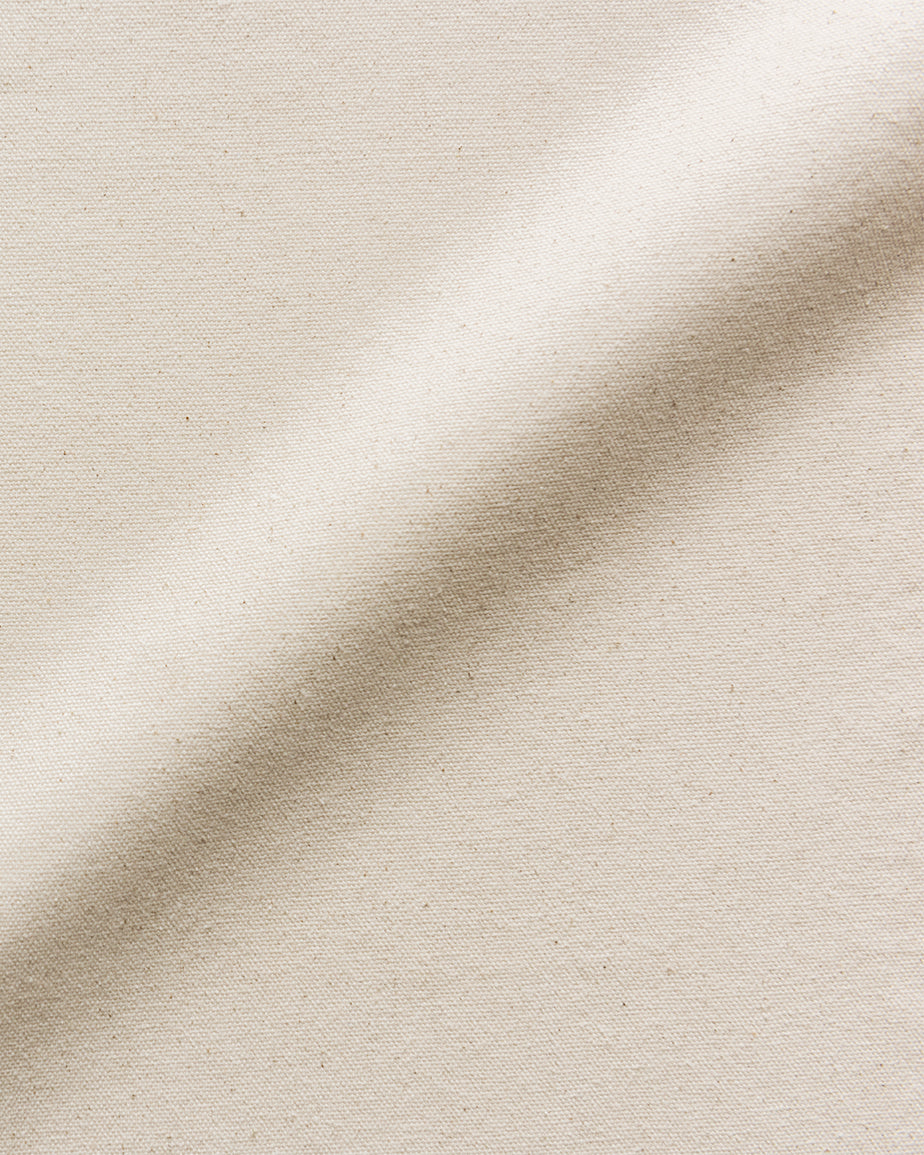 Swatch of Beach Walk, a warm, creamy beige Cotton Canvas
