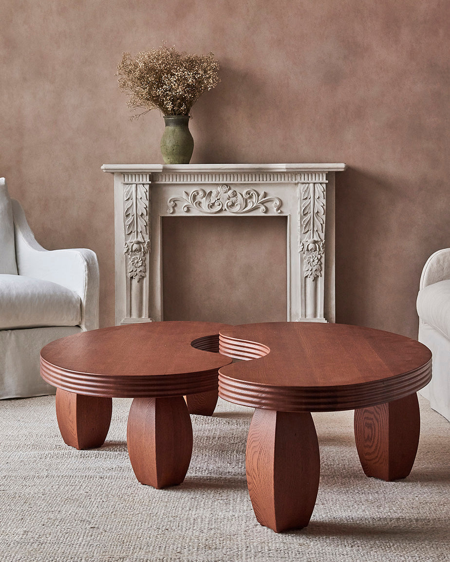 Two Pisces Tables in Spiced Oak placed in a room next to each other