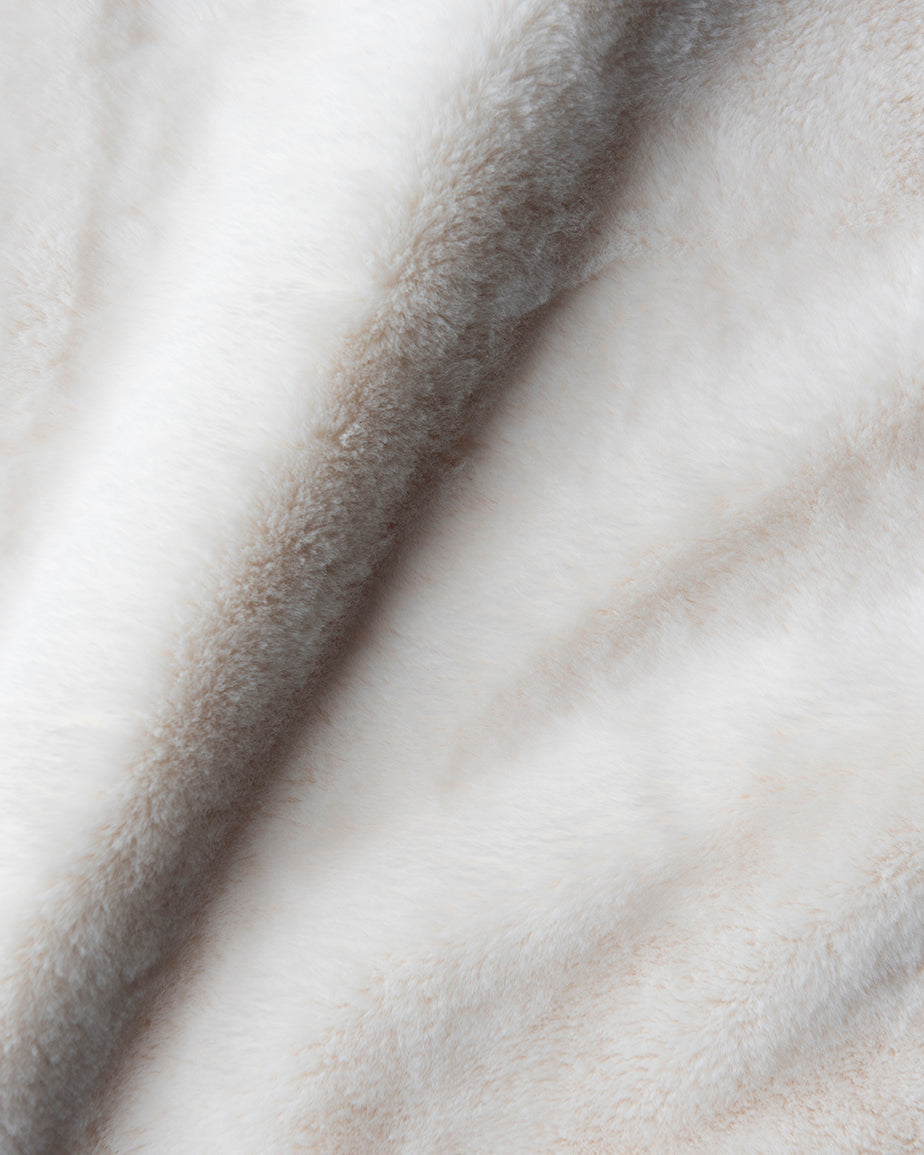 Swatch of Dandelion Poof, a creamy off-white Recycled Faux Fur