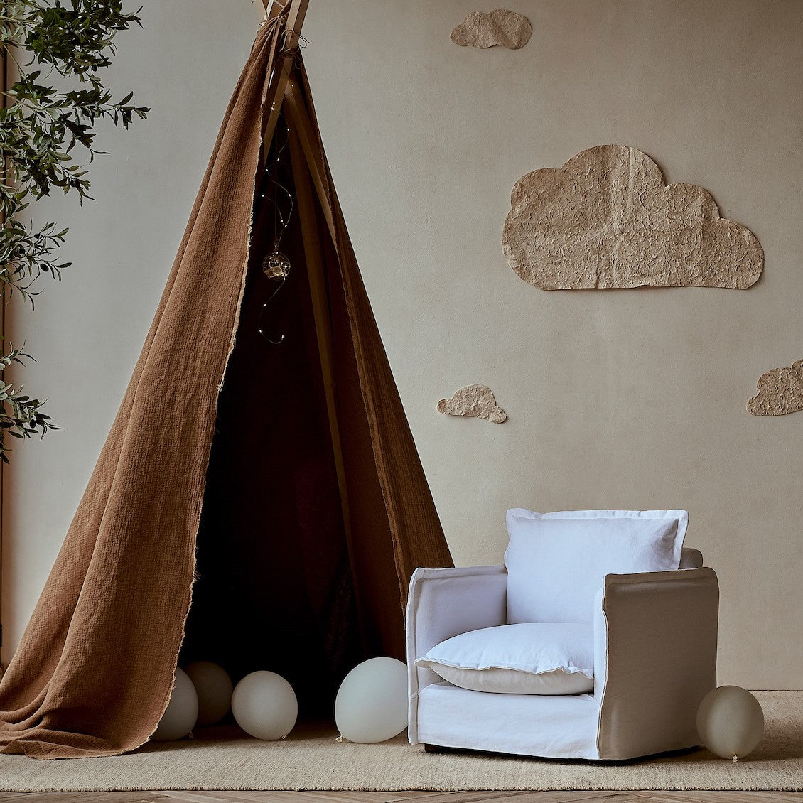 Little Neva Chair in Pacific Pearl, a cool, pure white Cotton Linen, placed in a nursery decorated room