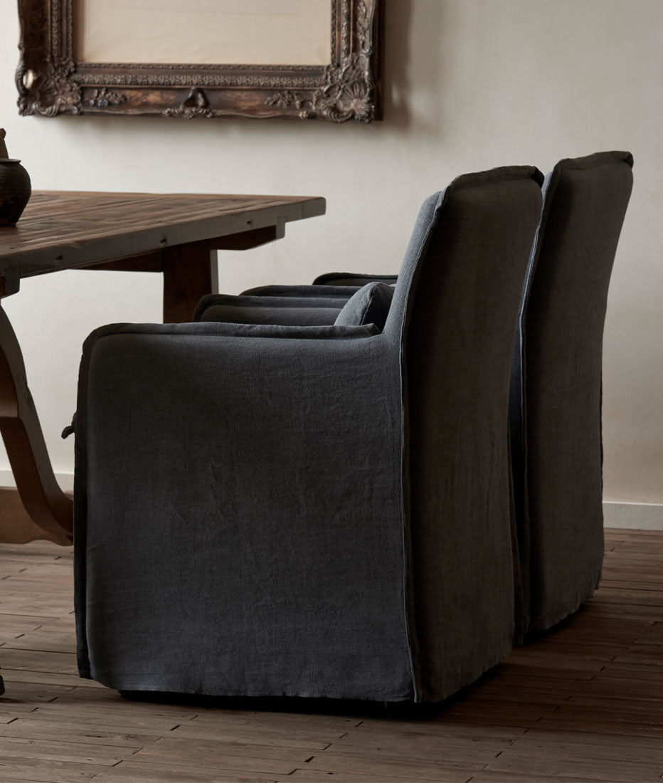 A pair of Melo Dining Chairs in Light Weight Linen Black Pepper