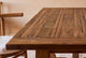 Slide #6 Close up of Leona Dining Table in 100% Reclaimed Chinese Heritage Pine, a medium, bosc pear shade with earthy undertones