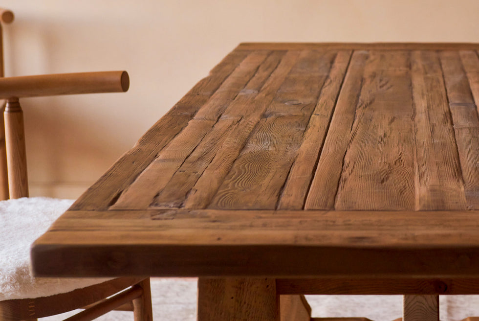 Close up of Leona Dining Table in 100% Reclaimed Chinese Heritage Pine, a medium, bosc pear shade with earthy undertones