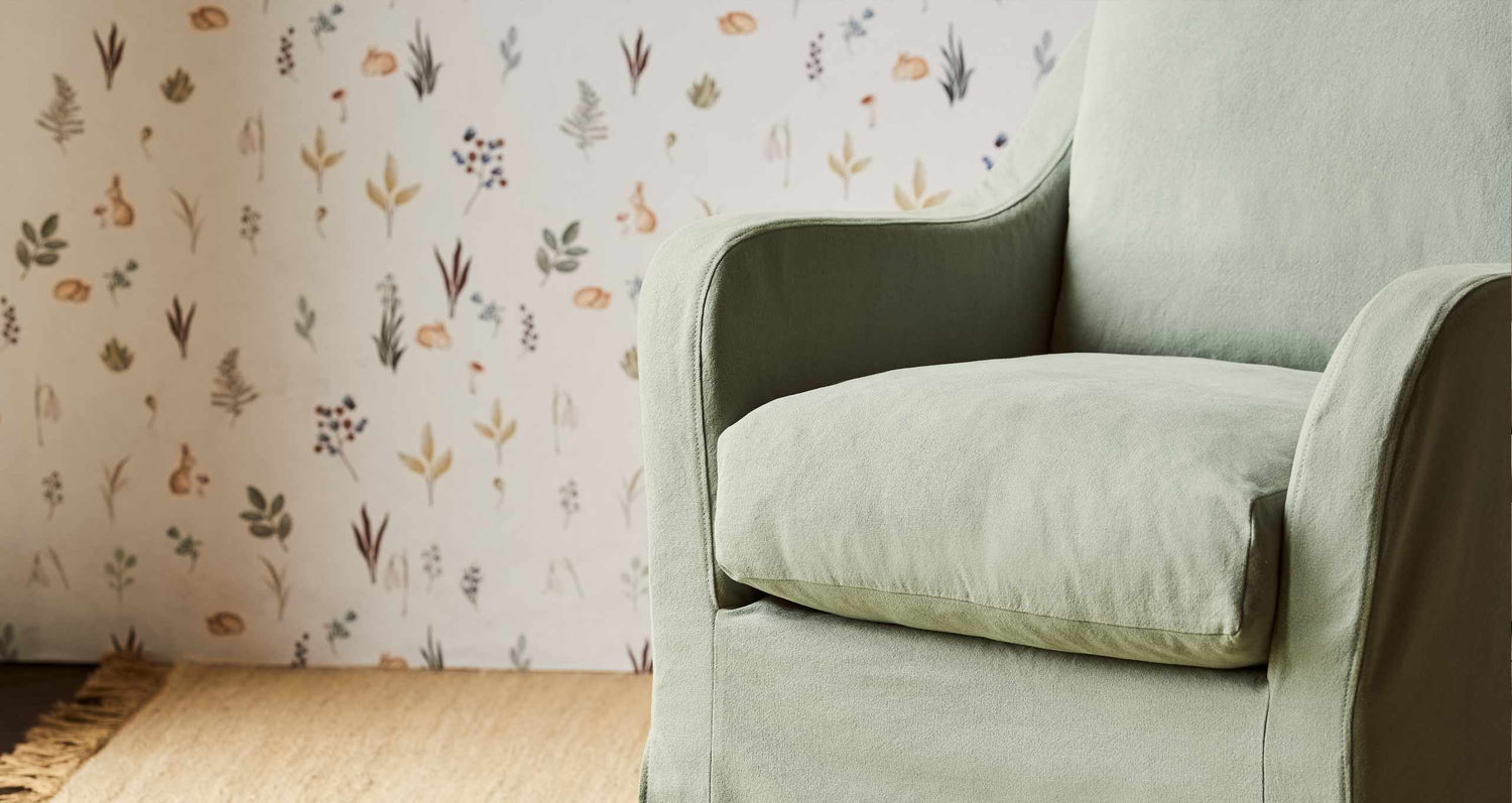 Close up of Esme Glider Chair in Thread Dyed Cotton Linen Hello Aloe