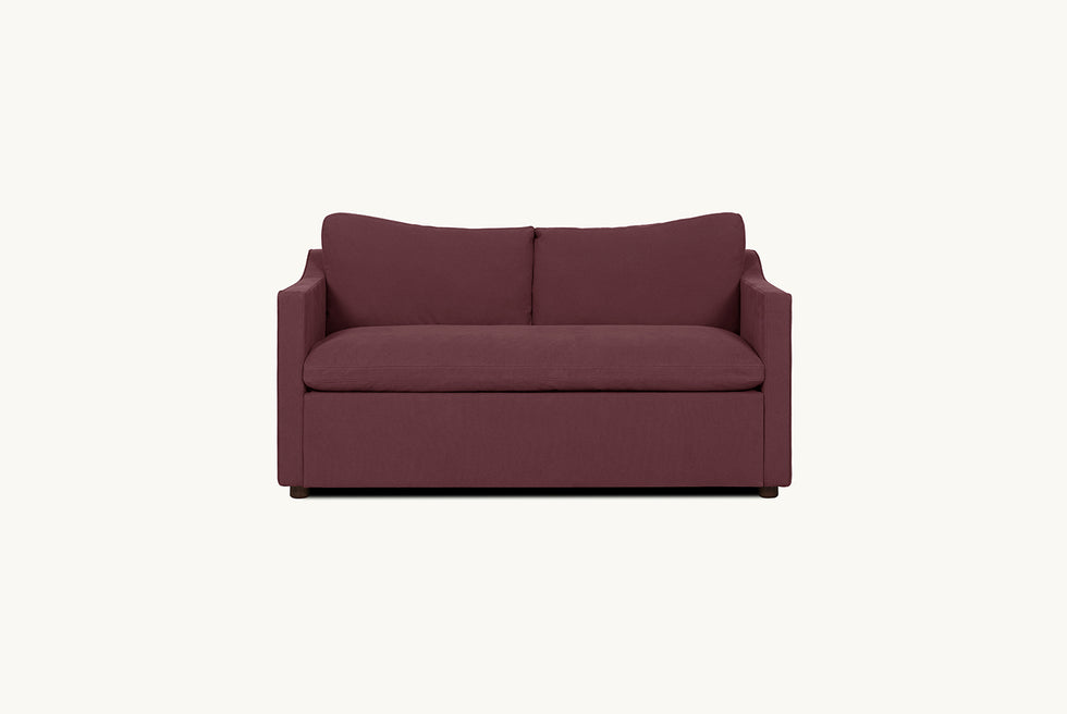 Amelia Sleeper Sofa in Summer Plum, a soft maroon Thread-Dyed Cotton Linen in a closed state