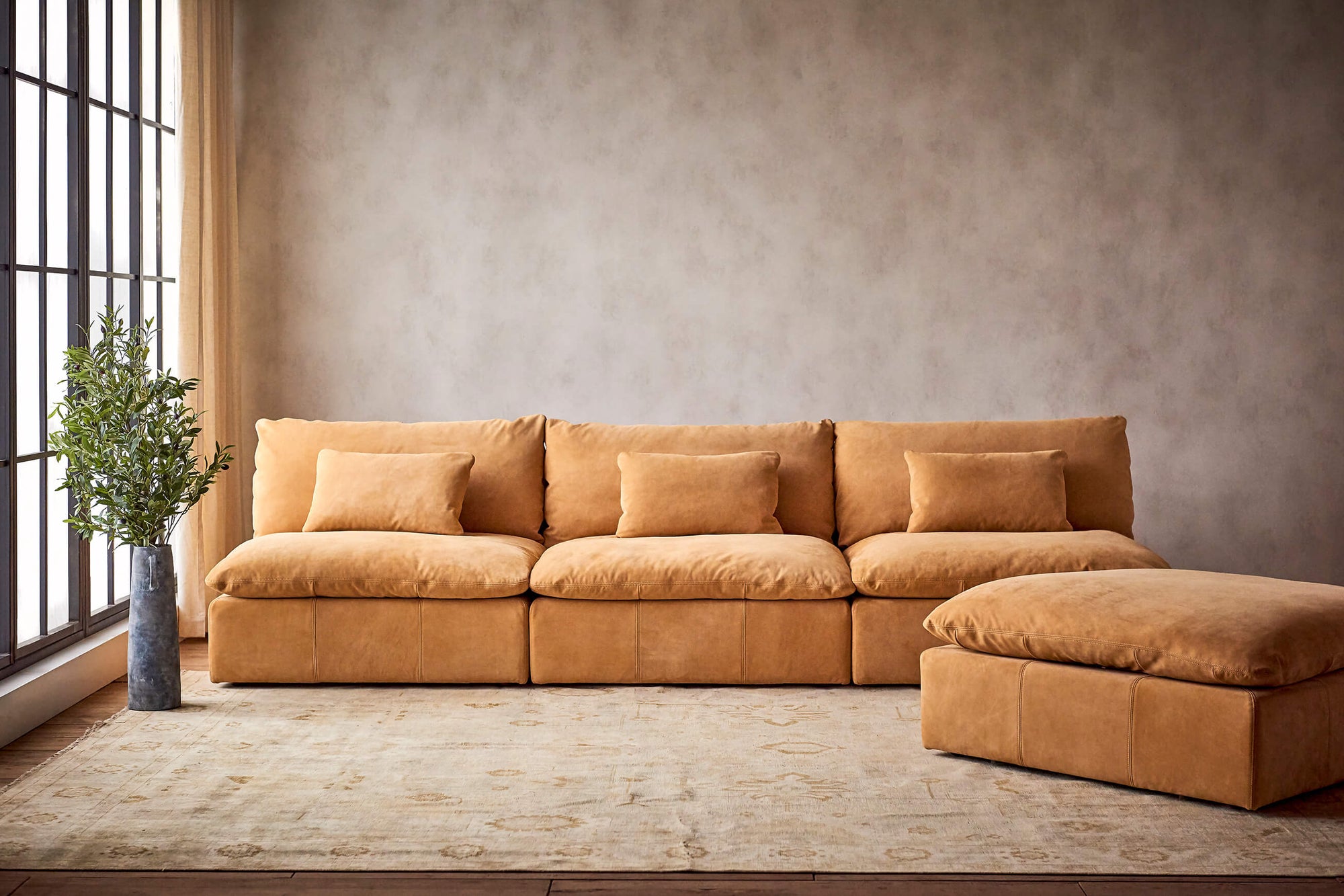 Aria Leather 4-piece Chaise Sectional Sofa in Mojave Glow, a tan Meridian Leather