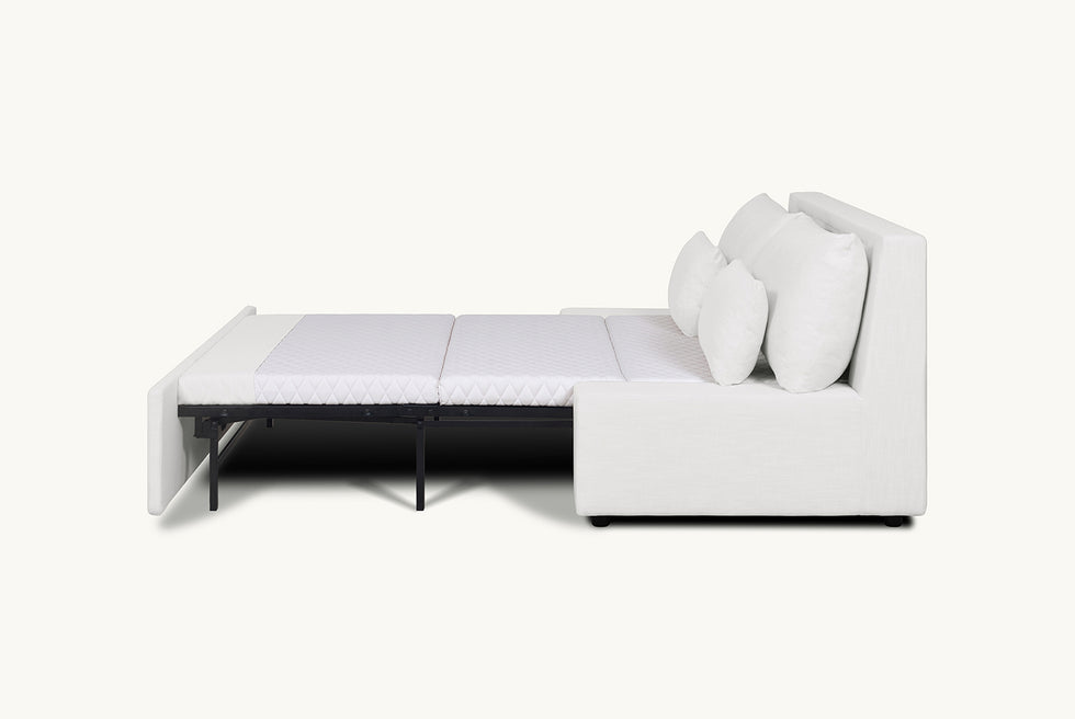 Side open view of Aria Full Sleeper Sofa in Young Coconut, a powdery white Recycled Poly Linen