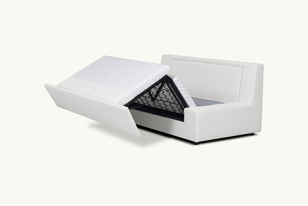Angled view of Aria Full Sleeper Sofa in Young Coconut, a powdery white Recycled Poly Linen, in the process of opening