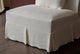 Slide #7 Close up of Dalia Armless Chair in Water Lily, a white Light Weight Linen with warm undertones