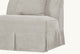 Slide #6 Detail view of the pleated skirt on the Dalia Armless Chair in Jasmine Rice, a light warm greige Medium Weight Linen