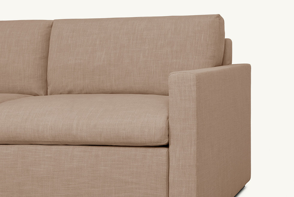 Close up of Devyn Queen Sleeper Sofa in Golden Reed, a sandy brown Recycled Poly Linen