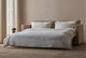Slide #3 Devyn Queen Sleeper Sofa in Golden Reed, a sandy brown Recycled Poly Linen, pulled out and made up with white linen bedding