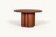 Slide #3 Angled view of Enzo Round Dining Table in Spiced Oak, a smokey paprika-hued 100% American red oak