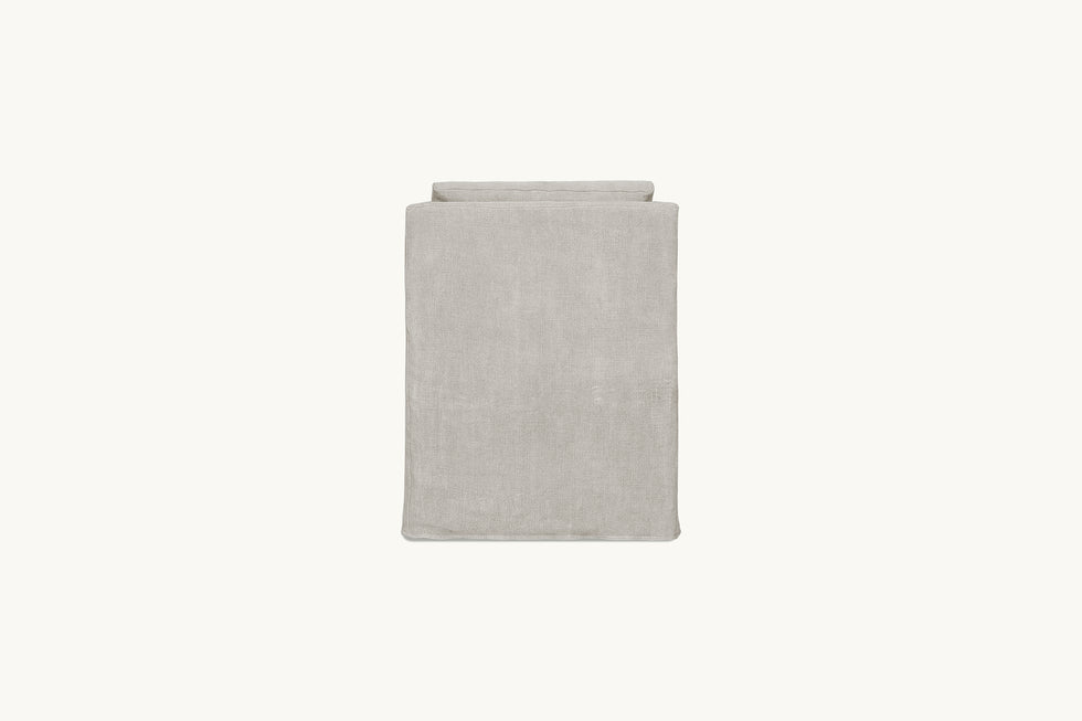 Back view of an Esme Dining Chair in Jasmine Rice, a light warm greige Medium Weight Linen