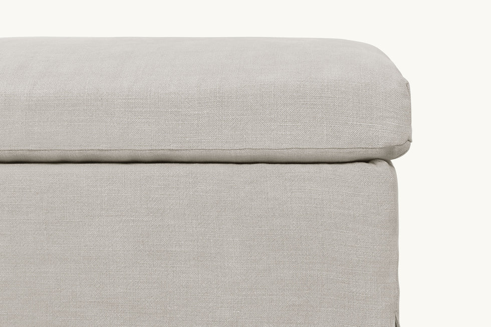 Close up view of Esmé Storage Bench in Jasmine Rice, a light warm greige Medium Weight Linen