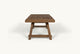 Slide #4 Side view of Fasso Dining Table in 100% Reclaimed Chinese Heritage Pine, a medium, bosc pear shade with earthy undertones