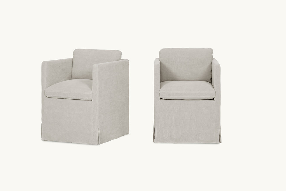 Front and angled view of Gabriel Dining Chair in Jasmine Rice, a light warm greige Medium Weight Linen