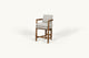 Slide #3 Angled view of Gio Dining Stool in Heritage Ash frame and cushions in Jasmine Rice, a light warm greige Medium Weight Linen