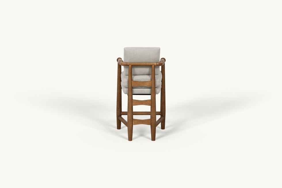 Back view of Gio Dining Stool in Heritage Ash frame and cushions in Jasmine Rice, a light warm greige Medium Weight Linen