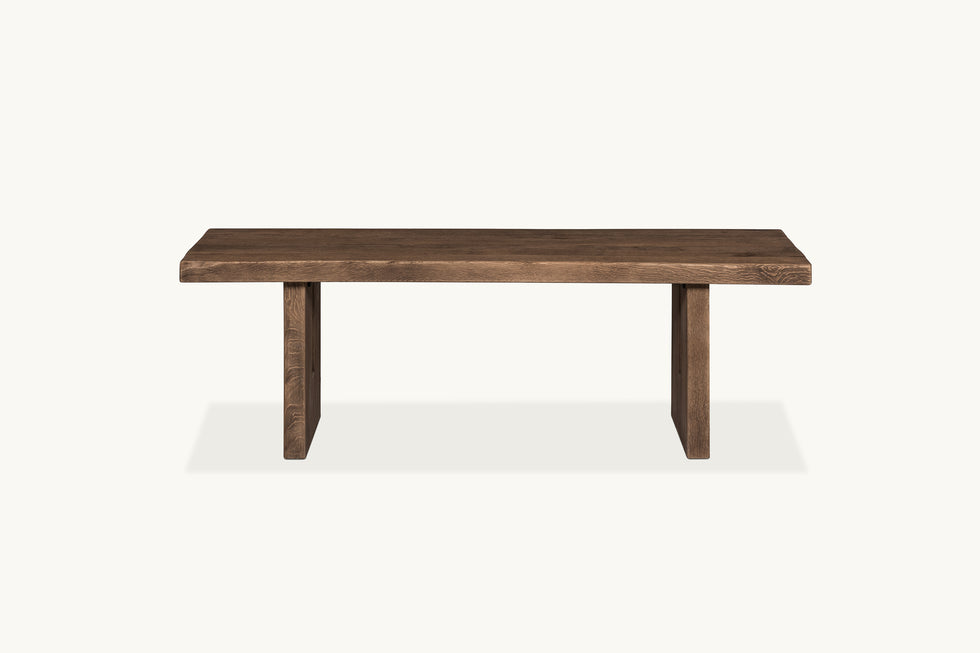 Front view of Kai Dining Bench in 100% Reclaimed Austrian Heritage Oak, a medium, bosc pear shade with earthy undertones