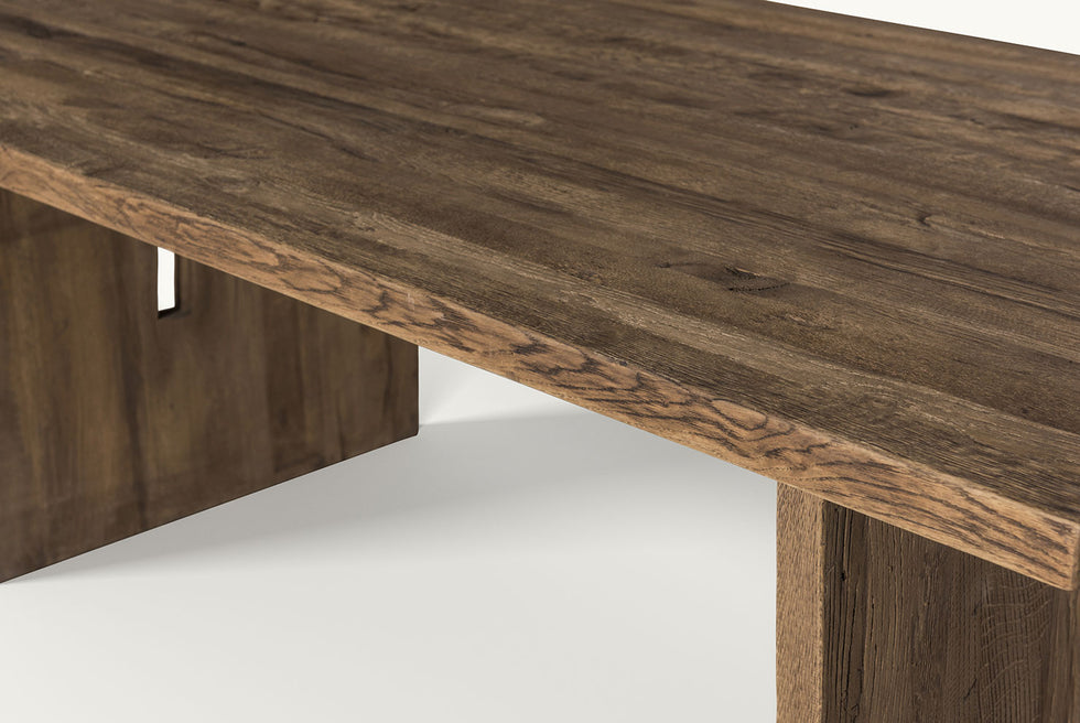 Close up view of Kai Dining Table in 100% Reclaimed Austrian Heritage Oak, a medium, bosc pear shade with earthy undertones