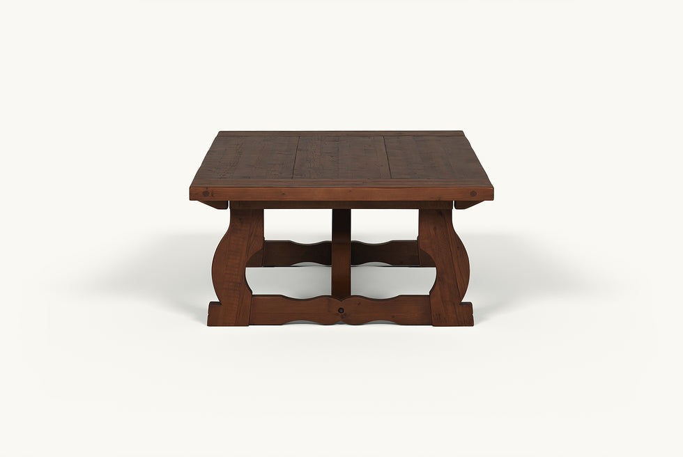 Side view of Leona Coffee Table in Dusky Pine, a deep, rich, molasses-colored 100% Chinese pine