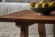 Slide #12 Close up of Leona Coffee Table in 100% Reclaimed Chinese Heritage Pine, a medium, bosc pear shade with earthy undertones, topped with a bowl of fresh pears