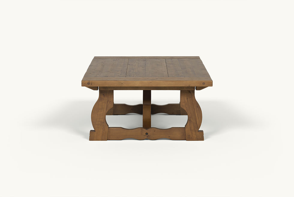 Side view of Leona Coffee Table in 100% Reclaimed Chinese Heritage Pine, a medium, bosc pear shade with earthy undertones