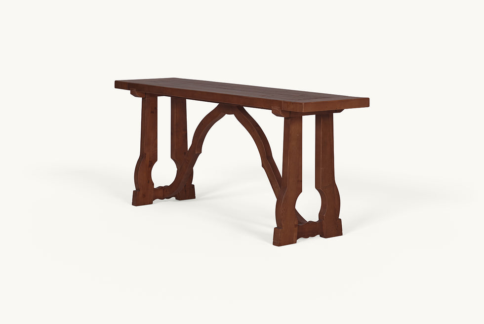 Angled view of Leona Console Table in Dusky Pine, a deep, rich, molasses-colored 100% Chinese pine
