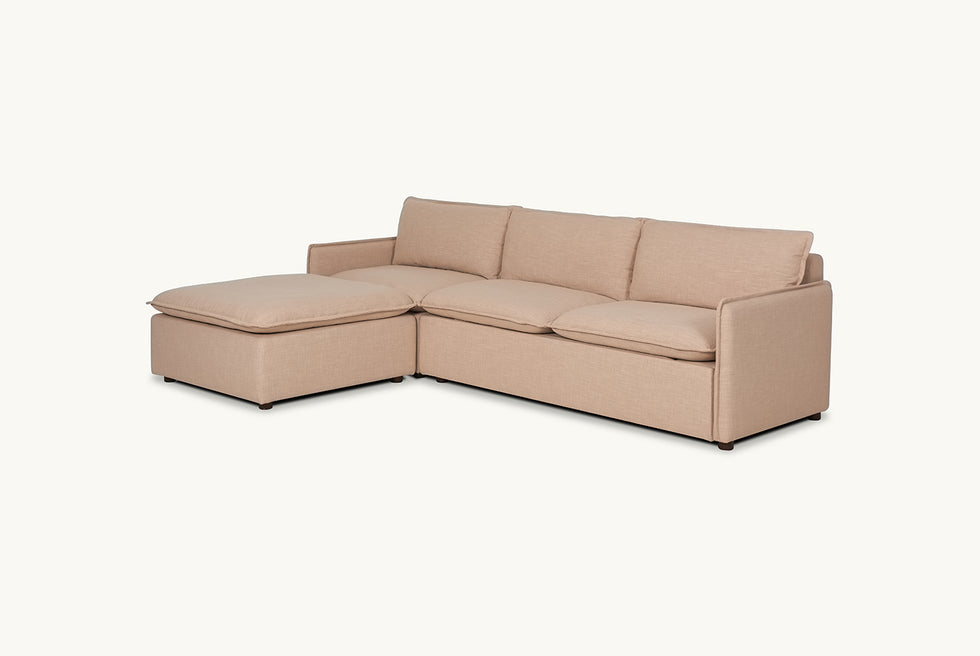 Angled view of Neva Sleeper Chaise Sectional in Golden Reed, a sandy brown Recycled Poly Linen