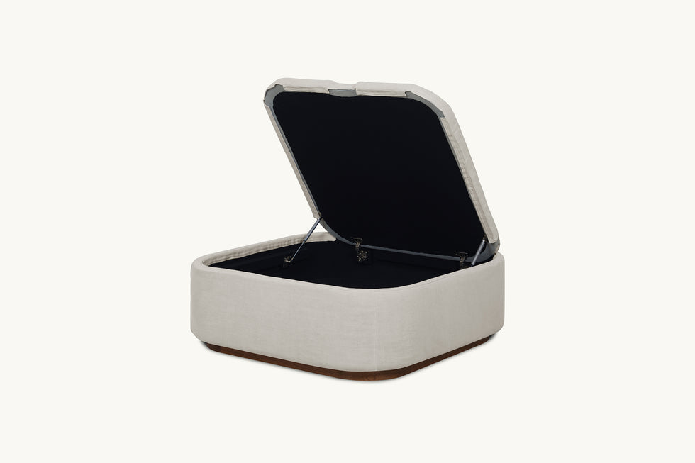 Opened view of Olea Storage Ottoman in Jasmine Rice, a light warm greige Medium Weight Linen