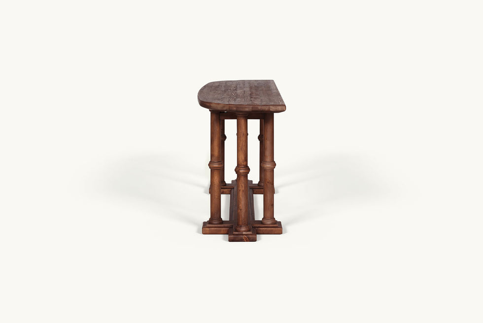 Side view of Pia Console Table in Dusky Pine, a deep, rich, molasses-colored 100% Chinese pine