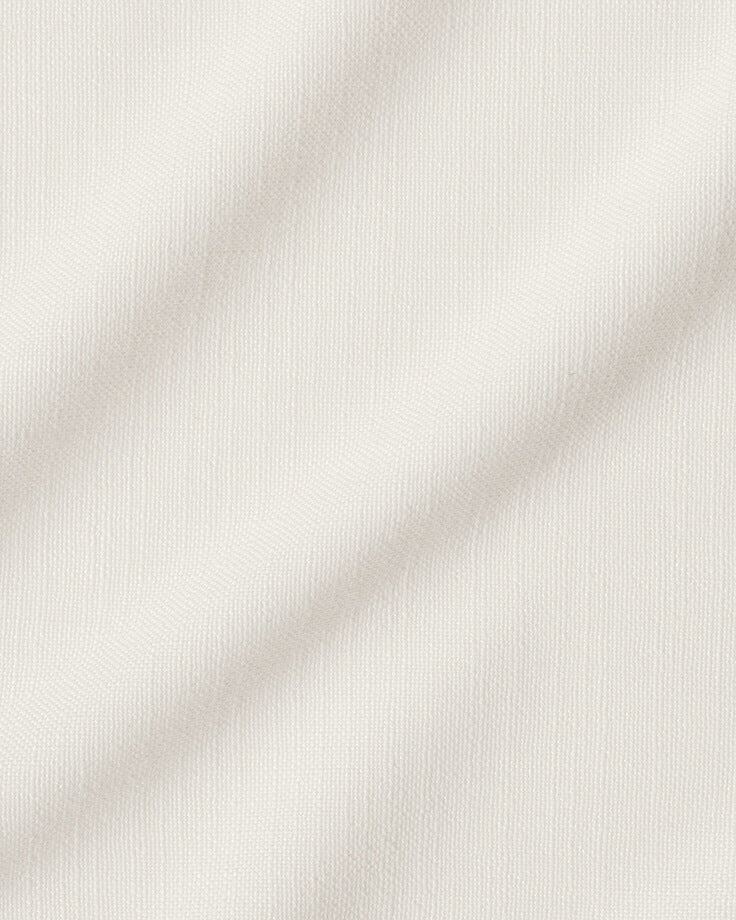 Swatch of First Light, a warm white linen-like recycled polyester.