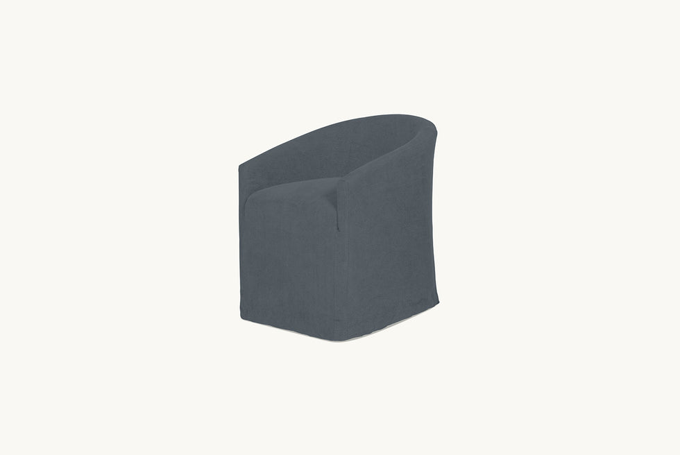 Angled front view of a Ziki Dining Chair in Black Pepper, a cool charcoal grey Light Weight Linen