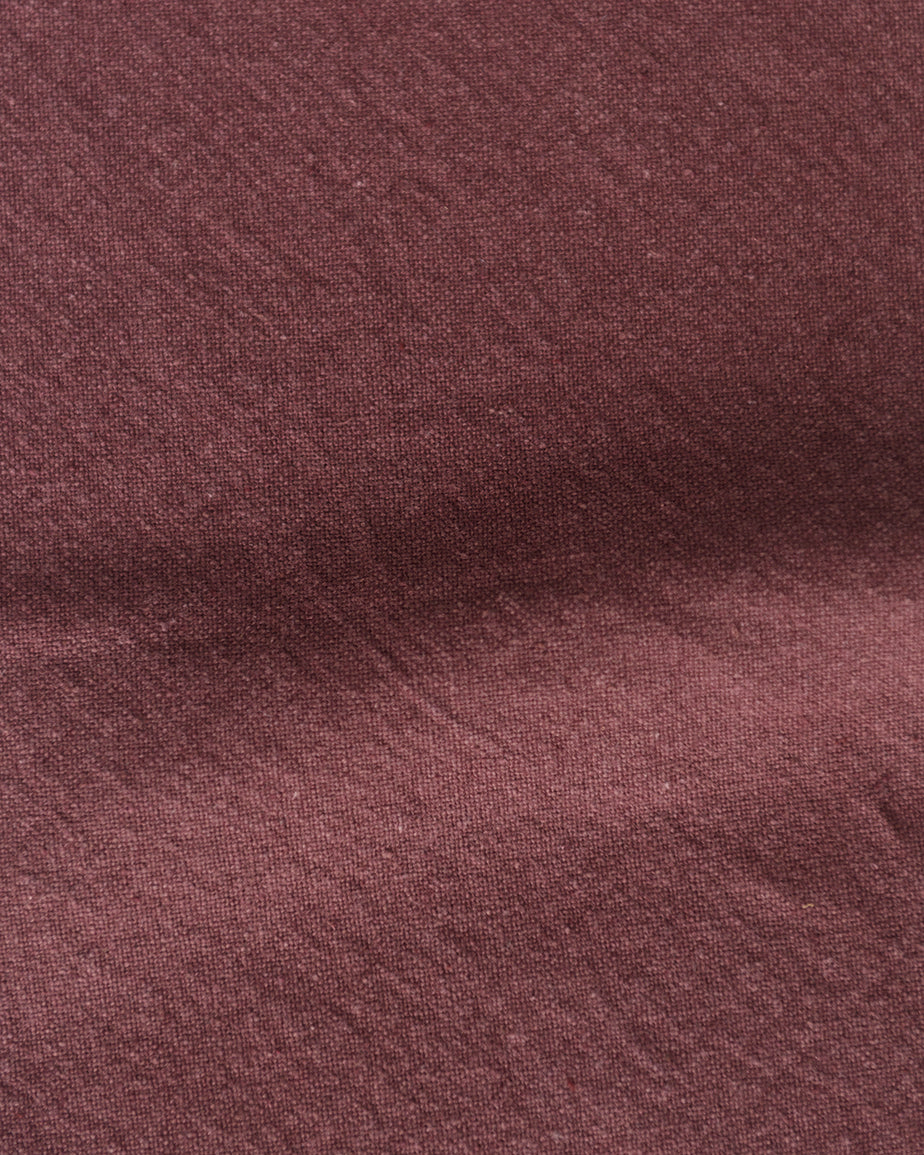 Swatch of Summer Plum, a soft maroon Thread-Dyed Cotton Linen