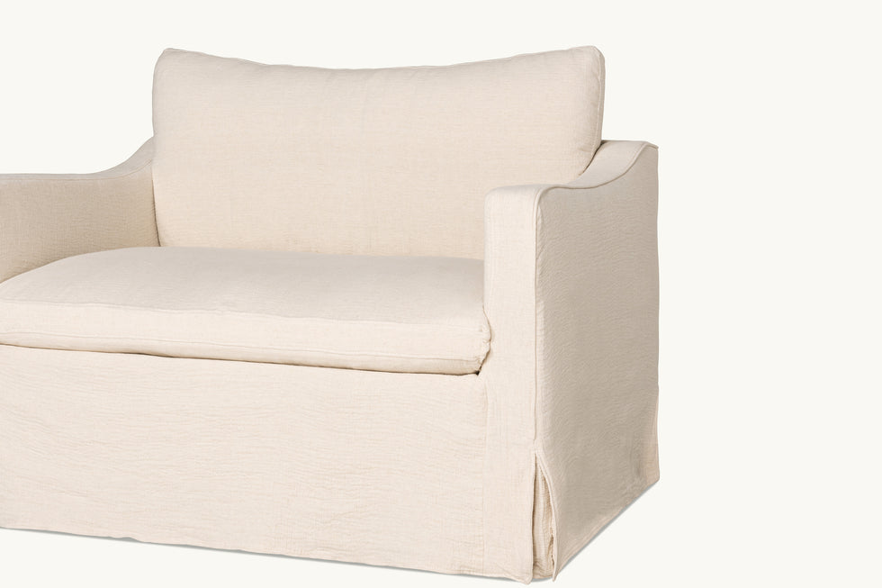 Close up view of Amelia Chair in Corn Silk, a light beige Washed Cotton Linen