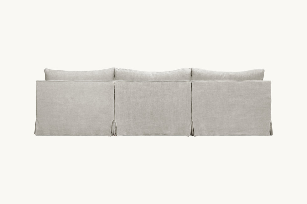 Back view of Amelia Corner Sectional Sofa in Jasmine Rice, a light warm greige Medium Weight Linen