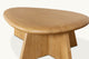 Slide #4 Close up, top view of Amina Coffee Table in Tinted Oak, a golden, wheat-colored 100% American red oak