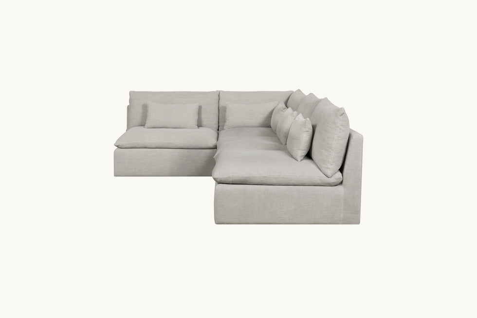 Side view of Aria Short L-Shape Sectional Sofa in Jasmine Rice, a light warm greige Medium Weight Linen