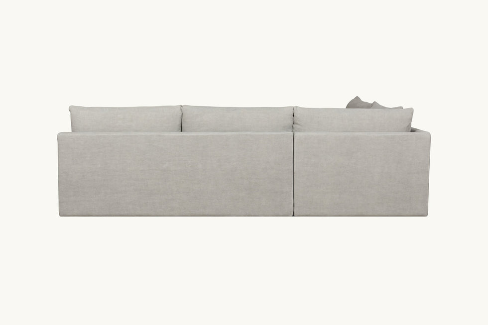 Back view of Aria Short L-Shape Sectional Sofa in Jasmine Rice, a light warm greige Medium Weight Linen