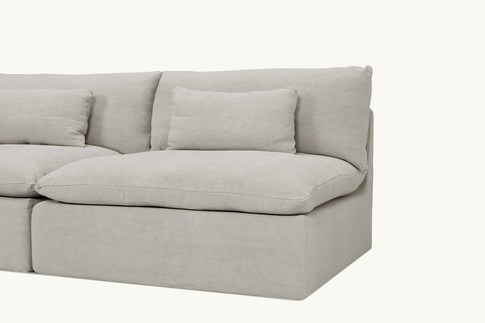 Close up view of Aria Short L-Shape Sectional Sofa in Jasmine Rice, a light warm greige Medium Weight Linen