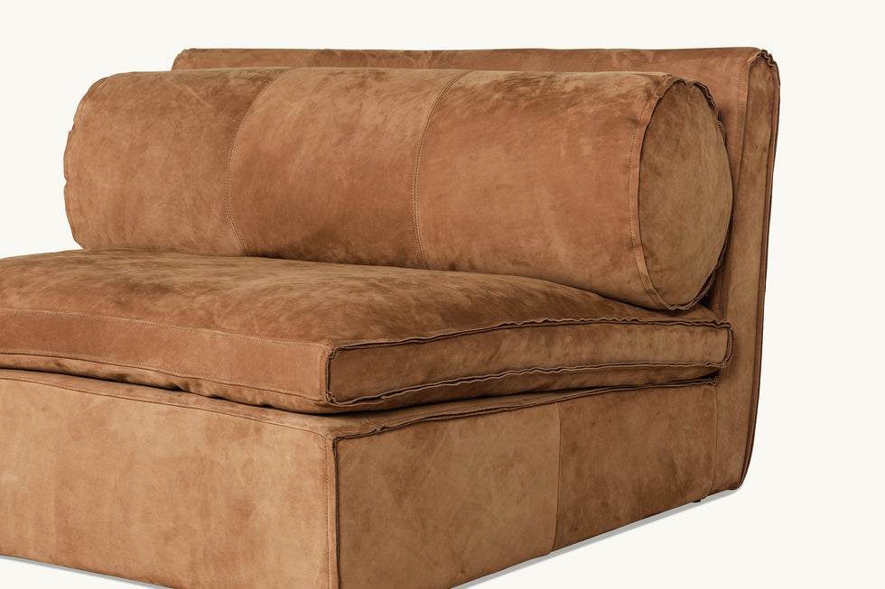 Close up view of Camino Leather Chair in Sunset Canyon, a cognac brown Meridian Leather