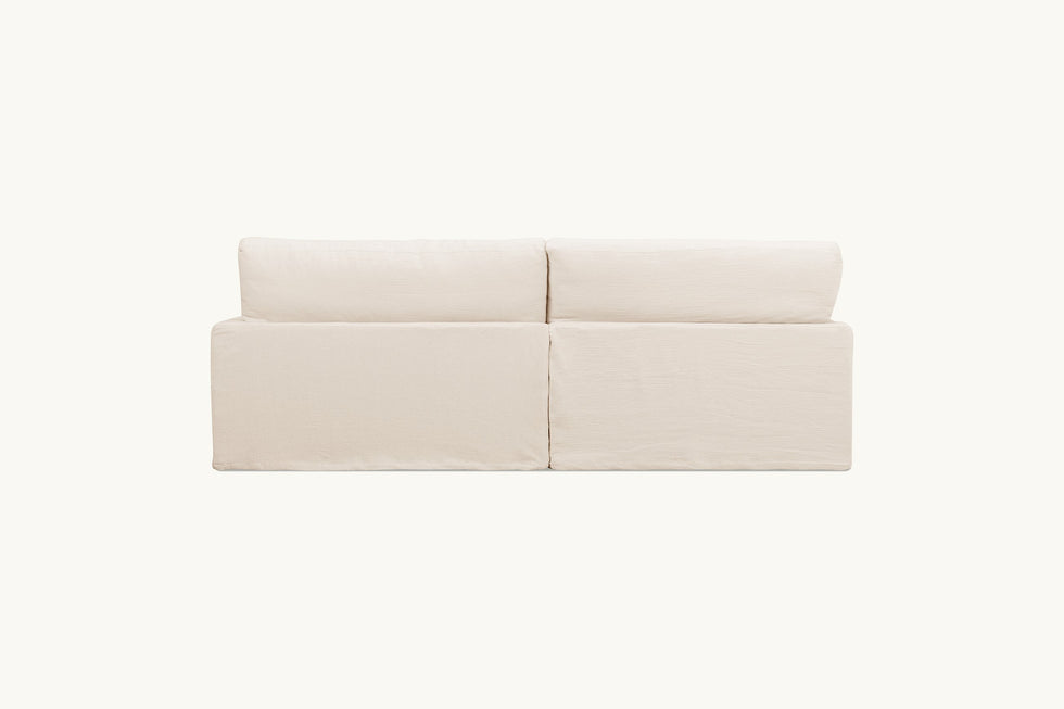 Back view of Devyn L-Shape Sectional Sofa in Corn Silk, a light beige Washed Cotton Linen